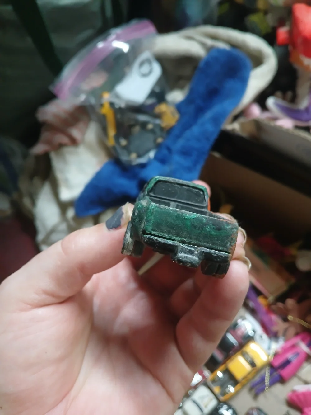 1:64 scale die-cast model is a vintage Hot Wheels Ford F-150 pickup